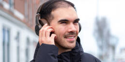 Beatmaker music producer listening to beats on his headphones. Beatstars airbit