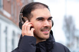 Beatmaker music producer listening to beats on his headphones. Beatstars airbit